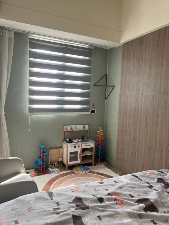 Postel nebo postele na pokoji v ubytování Panda Homestay