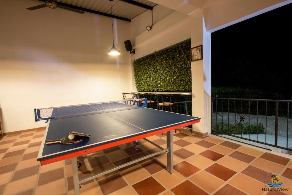 Stolní tenis v ubytování Natural View Resorts Melgar nebo okolí