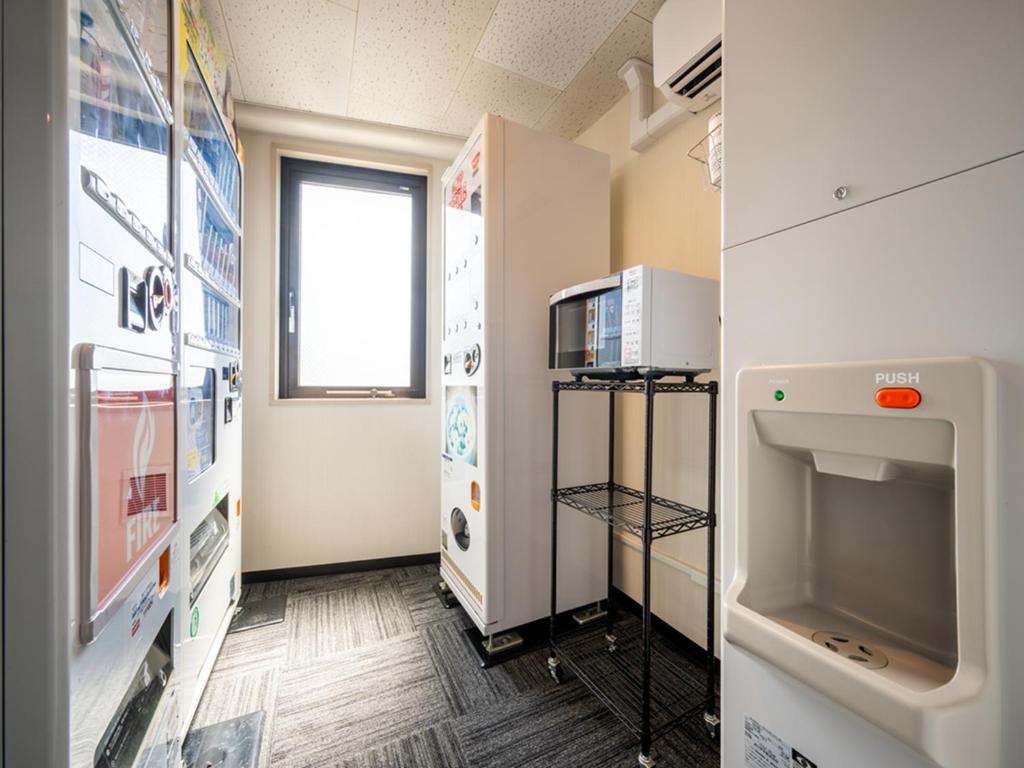 Kuchyň nebo kuchyňský kout v ubytování APA Hotel Maebashieki-Kita