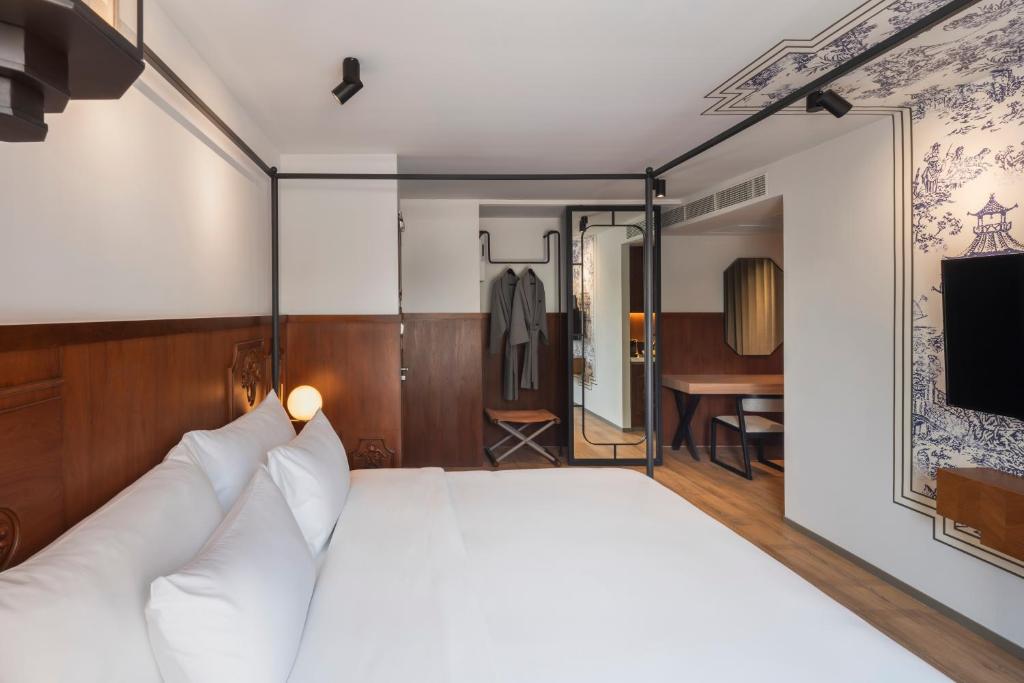 TV a/nebo společenská místnost v ubytování PASSA Hotel Bangkok