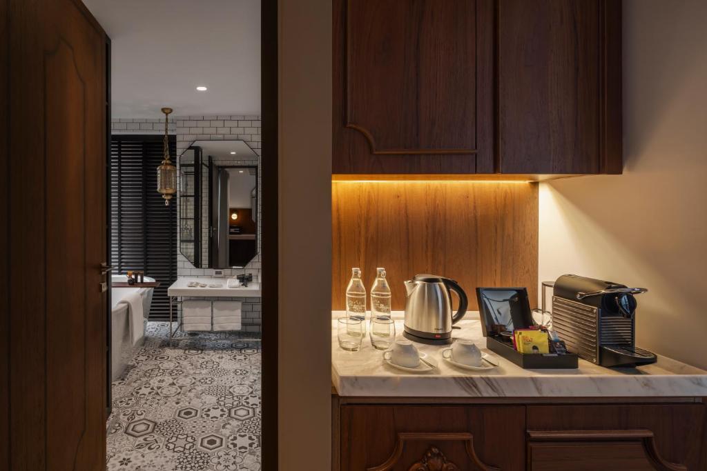 Kuchyň nebo kuchyňský kout v ubytování PASSA Hotel Bangkok