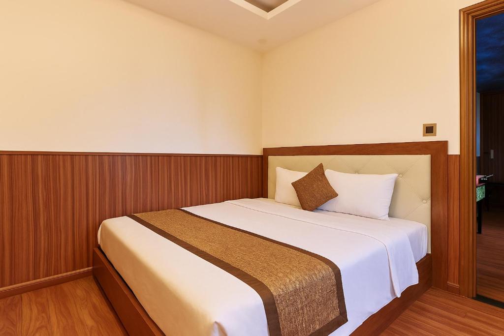 Postel nebo postele na pokoji v ubytování Mercury Boutique Hotel