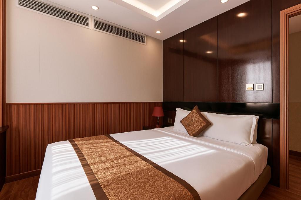 Postel nebo postele na pokoji v ubytování Mercury Boutique Hotel