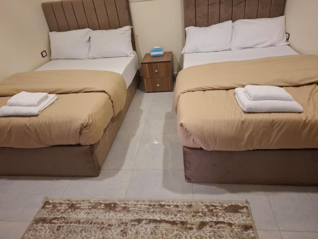 Postel nebo postele na pokoji v ubytování Seror Guest House