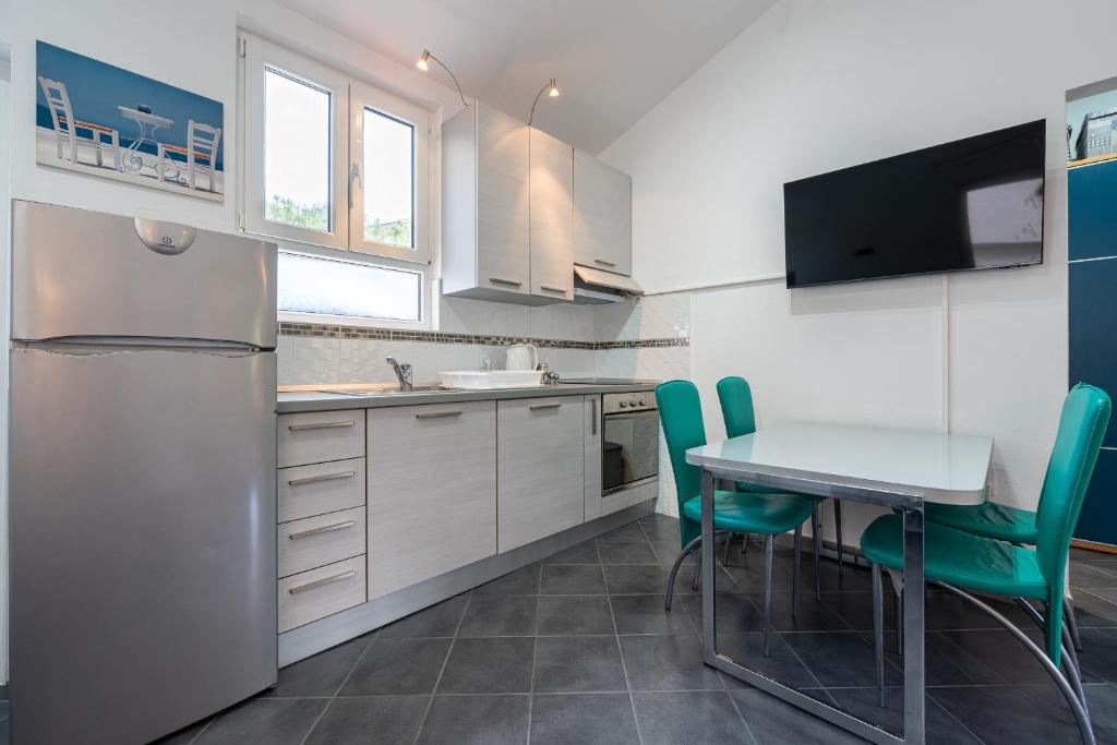 Kuchyň nebo kuchyňský kout v ubytování Grifon 72 Apartments
