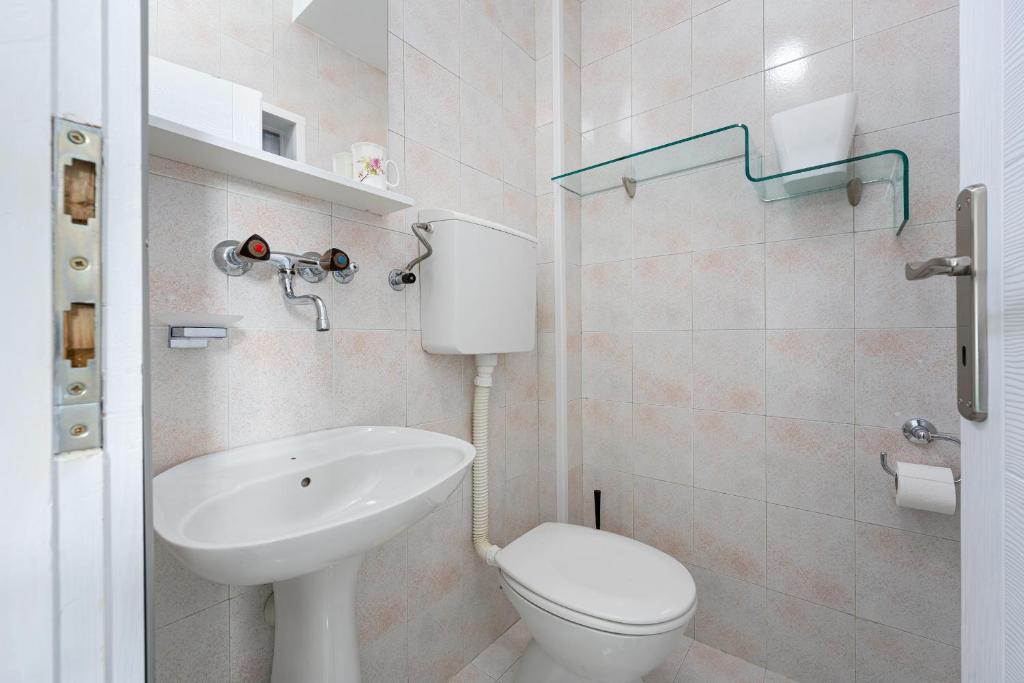 Koupelna v ubytování Grifon 72 Apartments