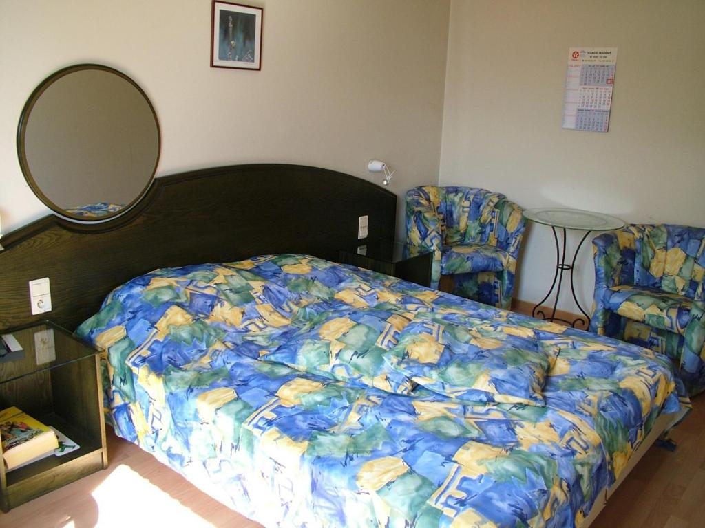 Postel nebo postele na pokoji v ubytování Alsput Hotel