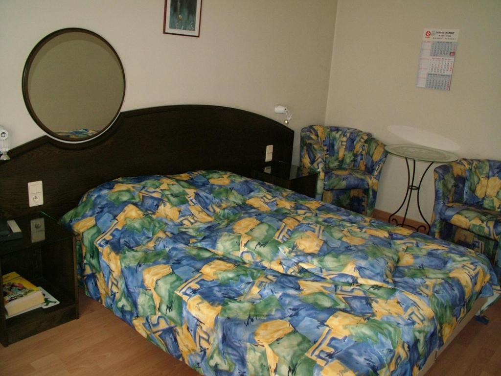 Postel nebo postele na pokoji v ubytování Alsput Hotel