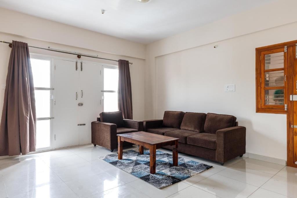 Posezení v ubytování Pinnacle Serviced Apartments