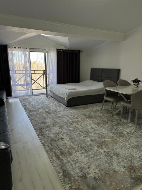 Ένα ή περισσότερα κρεβάτια σε δωμάτιο στο Asanova House