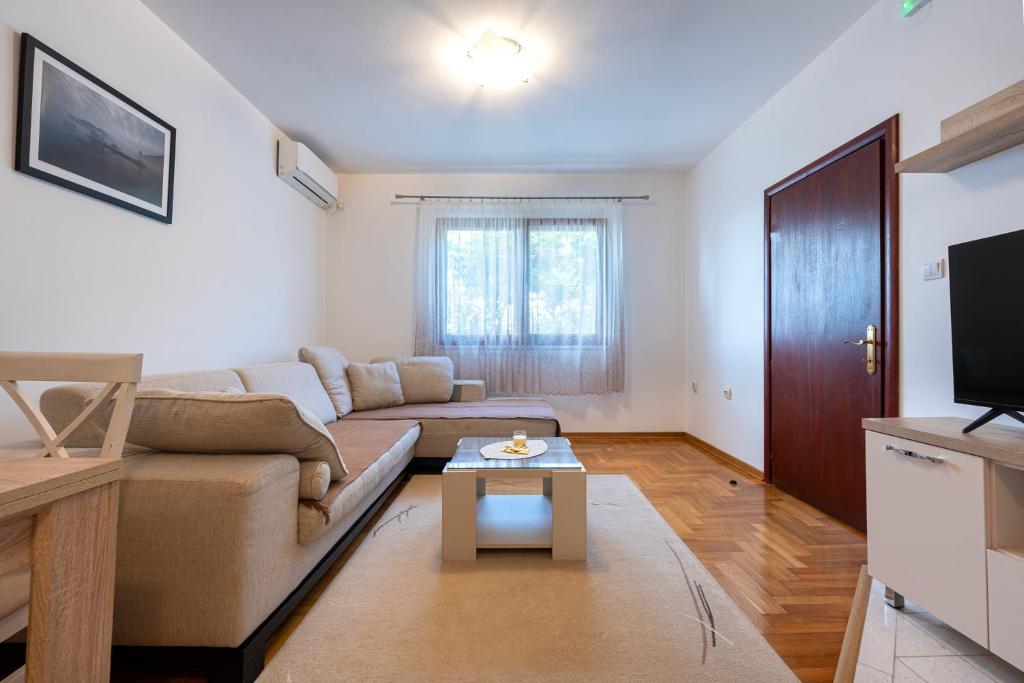 TV a/nebo společenská místnost v ubytování Hera City Apartment