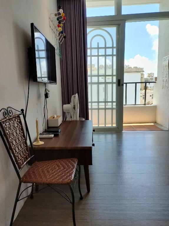 Sjónvarps- og/eða afþreyingartæki á Kenting Cozy B&B