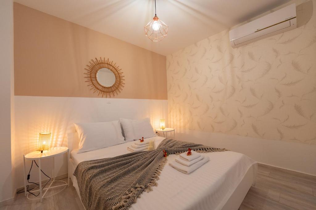 Postel nebo postele na pokoji v ubytování Pool and Breakfast Apartments Villa Maro