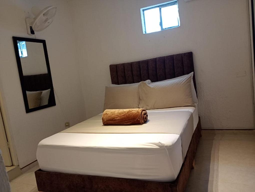 Postel nebo postele na pokoji v ubytování Hotel Aerocafe Pereira