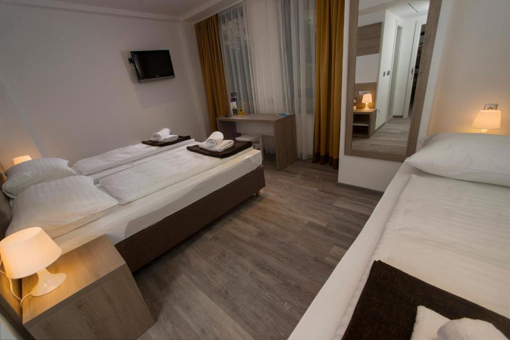 Postel nebo postele na pokoji v ubytování Hostel Sol