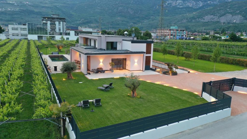 an aerial view of a house with a yard at Vinea Rural Resort - Adults only in Arco