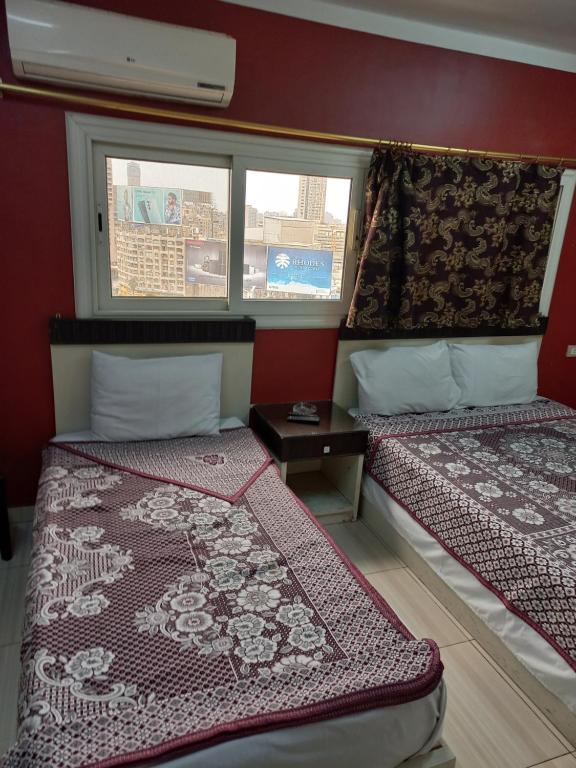 Postel nebo postele na pokoji v ubytování Isis Hostel 2
