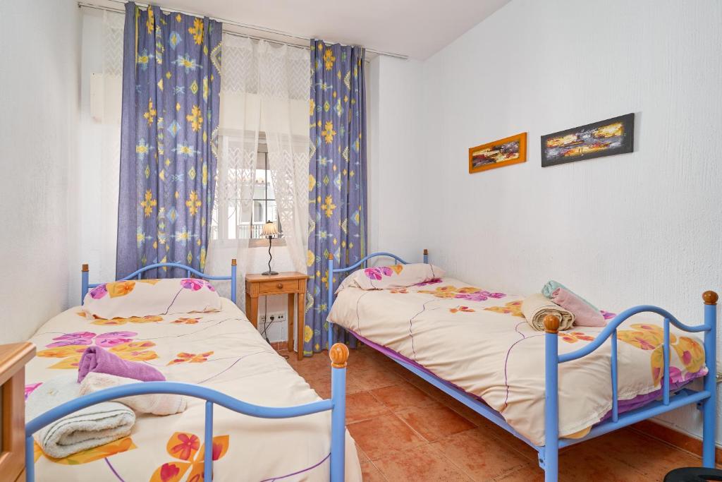 Postel nebo postele na pokoji v ubytování Carabeo 19