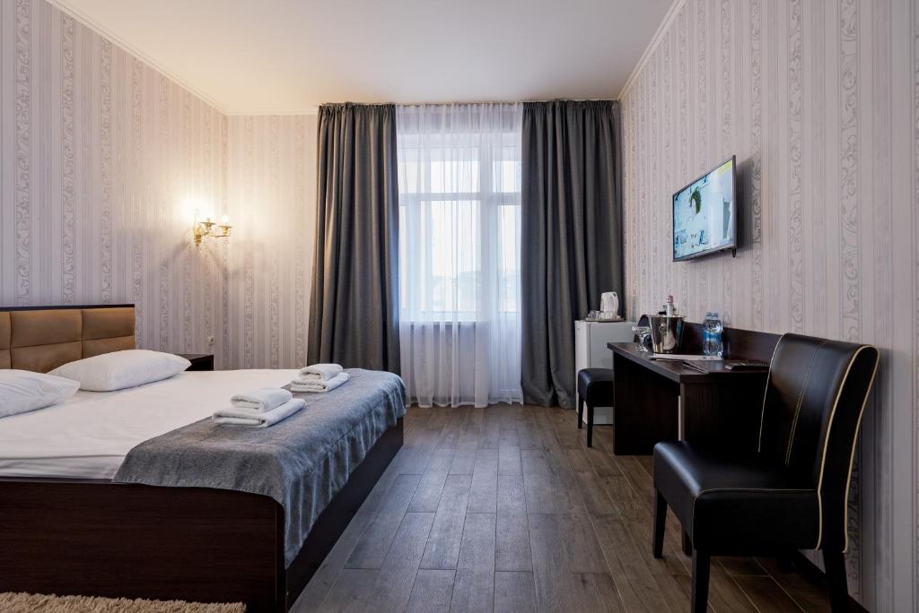 Postel nebo postele na pokoji v ubytování Hotel Verhovina