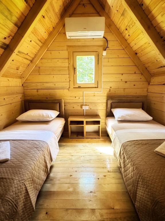 Postel nebo postele na pokoji v ubytování Camp River
