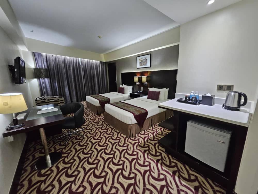 TV a/nebo společenská místnost v ubytování Ming Garden Hotel & Residences