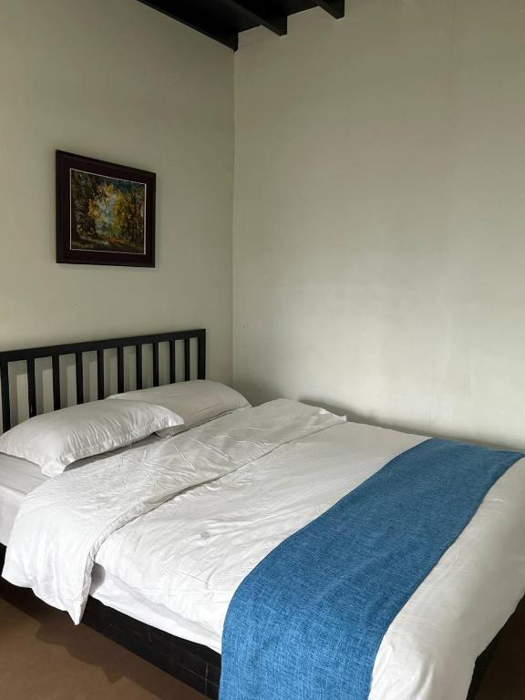 Postel nebo postele na pokoji v ubytování Hostel FUJI