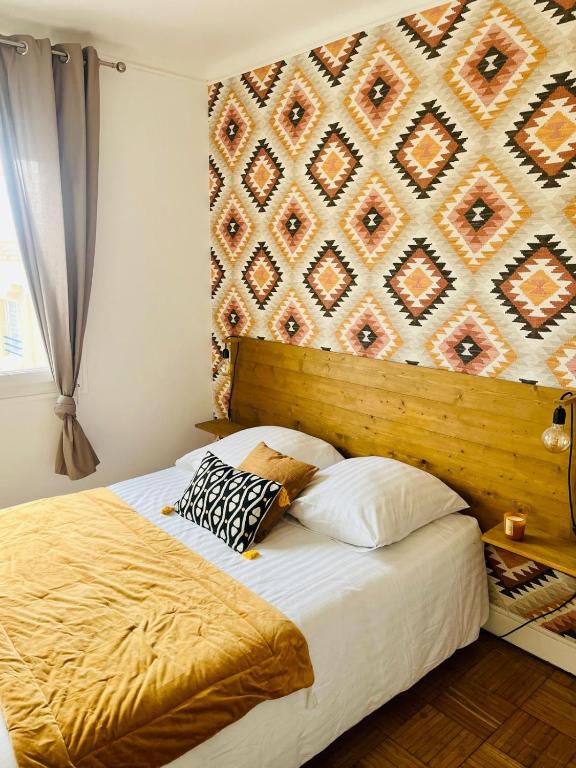 Postel nebo postele na pokoji v ubytování Chambre dans un appartement en collocation