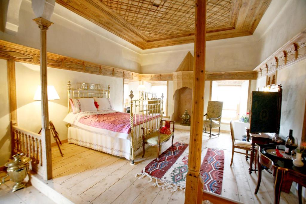 Postel nebo postele na pokoji v ubytování Heritage Homes Mehmet Ali Aga Konağı