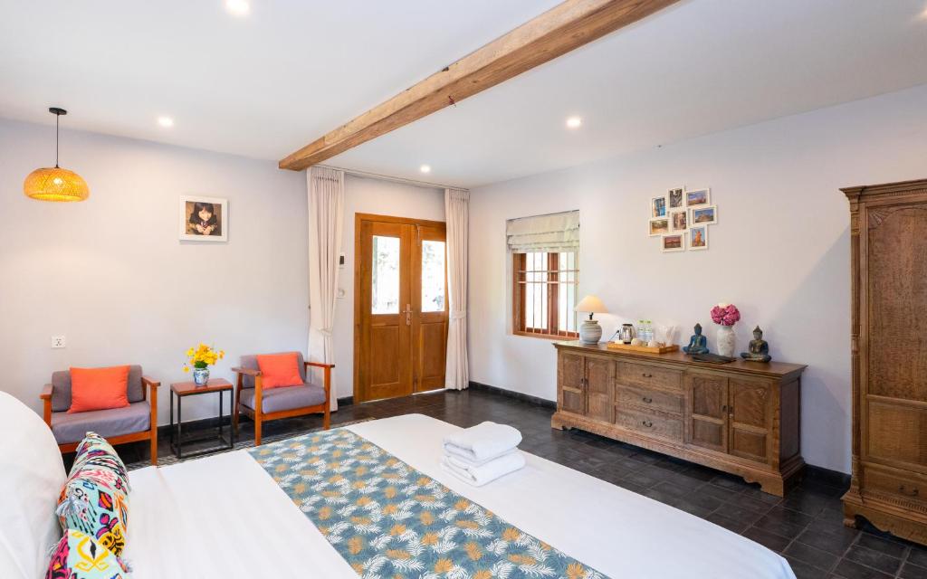 Postel nebo postele na pokoji v ubytování Beng Mealea Lodge