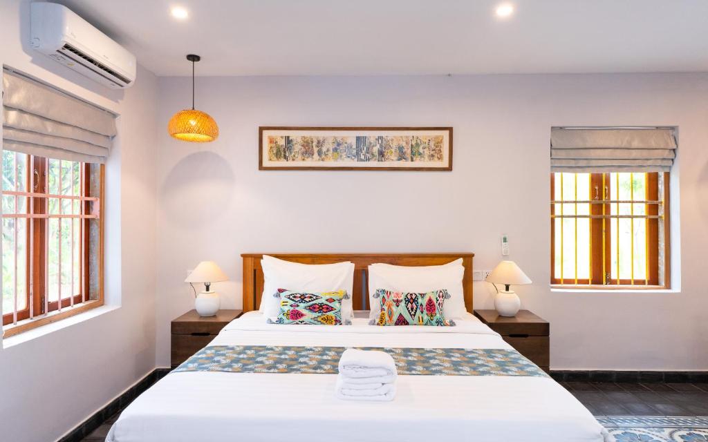 Postel nebo postele na pokoji v ubytování Beng Mealea Lodge