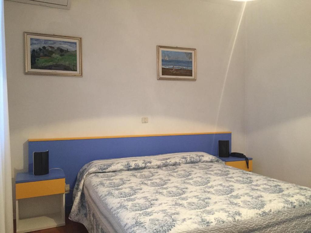 Postel nebo postele na pokoji v ubytování Hotel Halifax