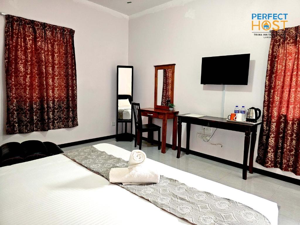 Letto o letti in una camera di Triima Inn Tanjung Rhu by Perfect Host