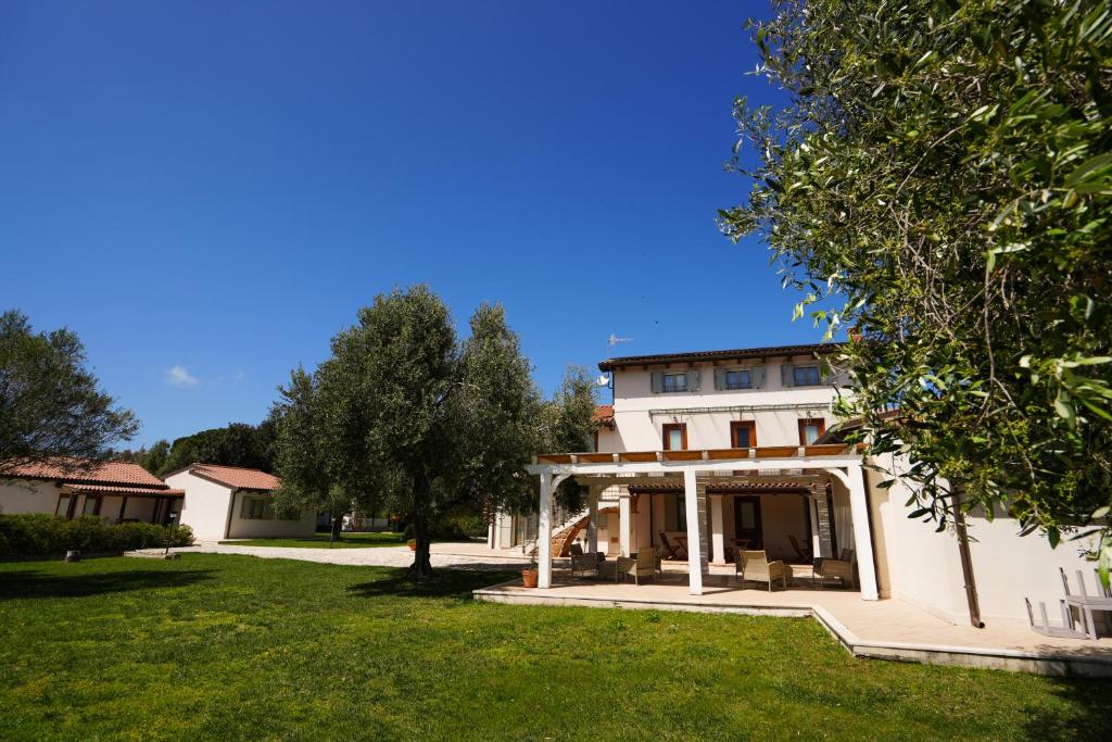 Een tuin van Agriturismo Casale Degli Ulivi Alghero