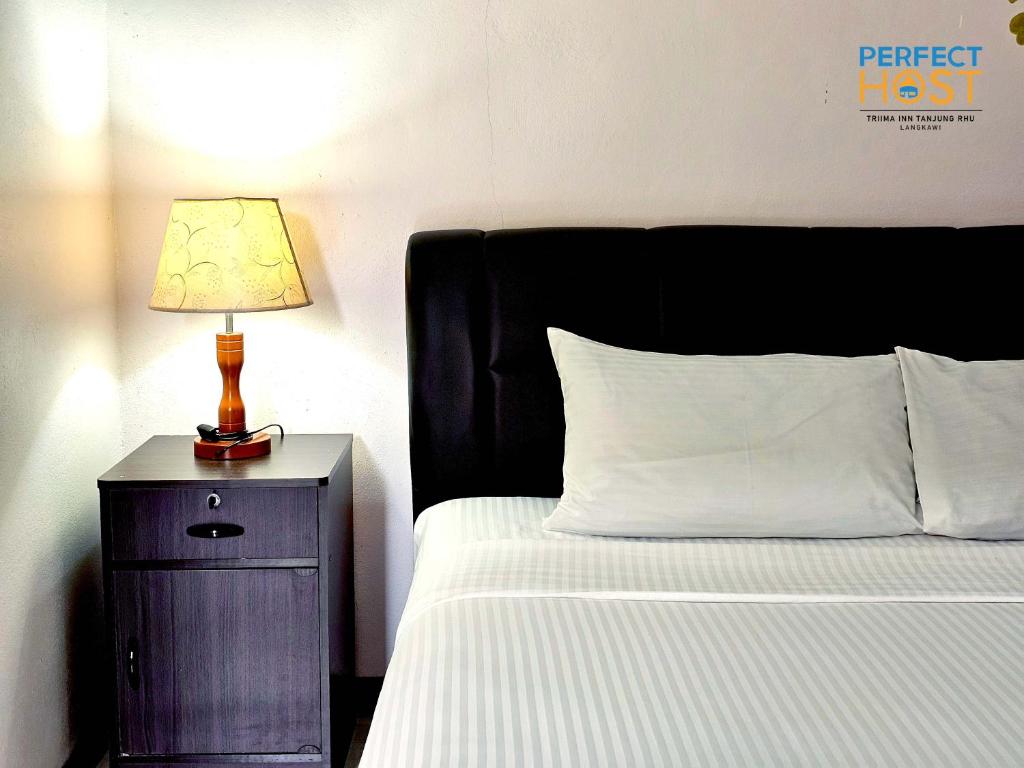 Letto o letti in una camera di Triima Inn Tanjung Rhu by Perfect Host