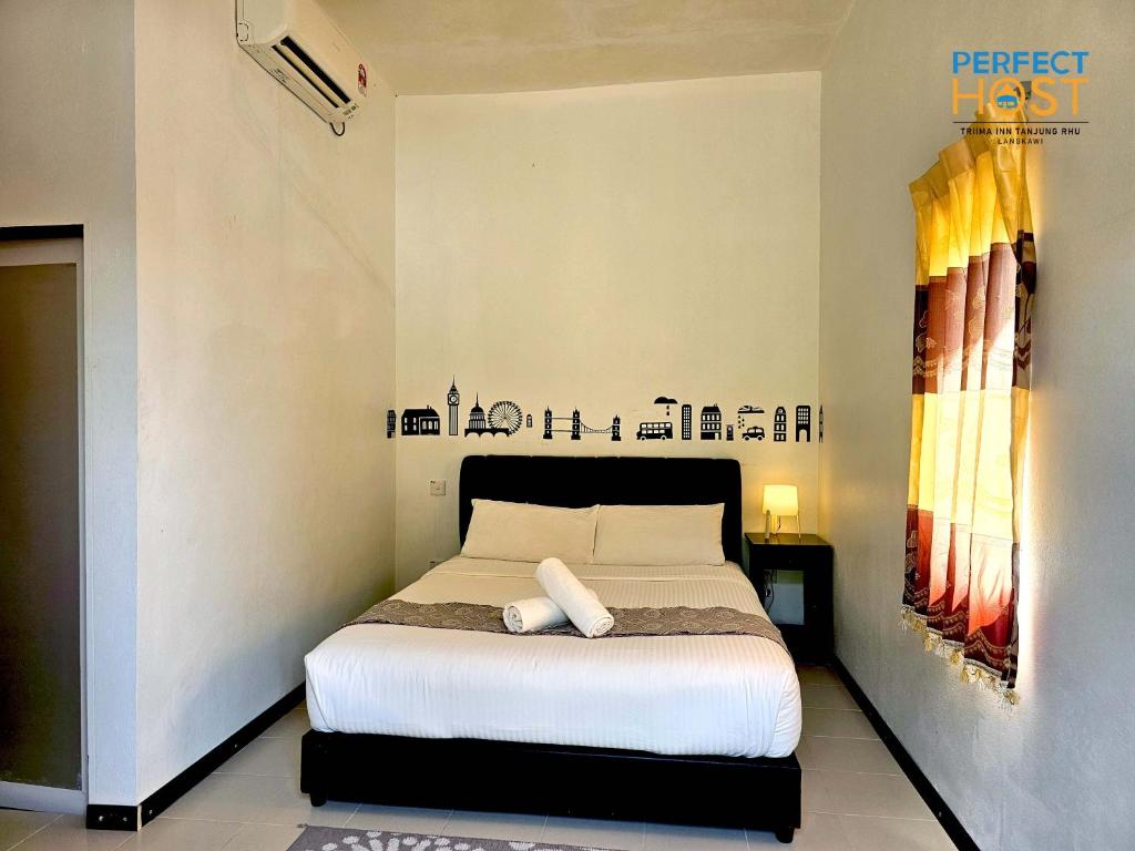 Letto o letti in una camera di Triima Inn Tanjung Rhu by Perfect Host