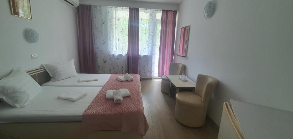 Postel nebo postele na pokoji v ubytování Hotel Pescarus