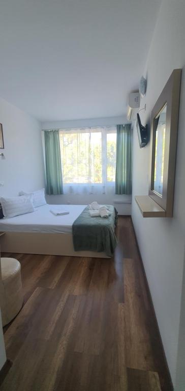 Postel nebo postele na pokoji v ubytování Hotel Pescarus