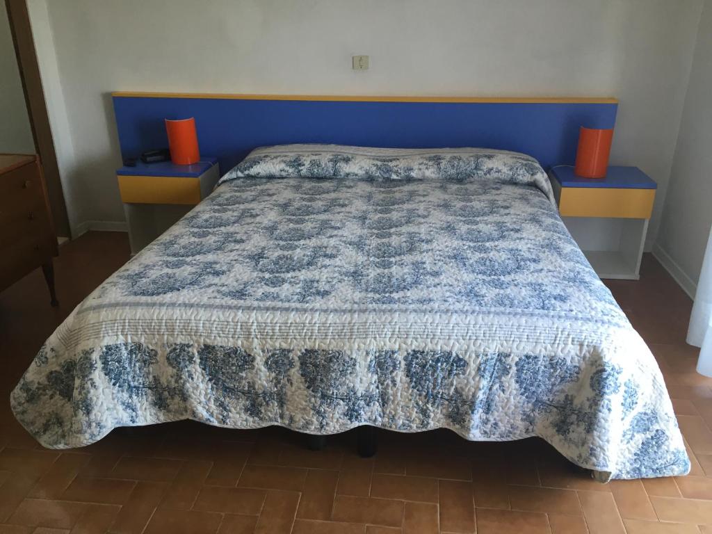 Postel nebo postele na pokoji v ubytování Hotel Halifax