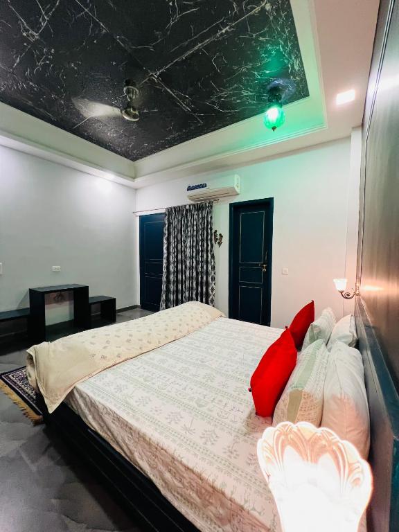 Cama o camas de una habitación en Shiv Kothi - Homestay