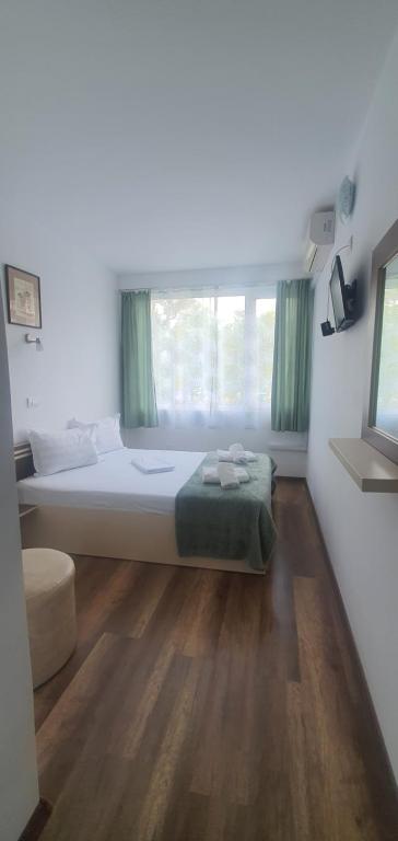 Postel nebo postele na pokoji v ubytování Hotel Pescarus