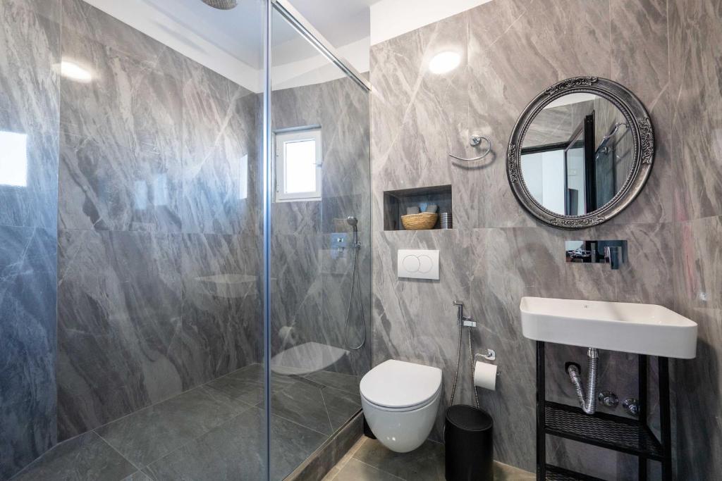 Koupelna v ubytování Vullkan Hotel