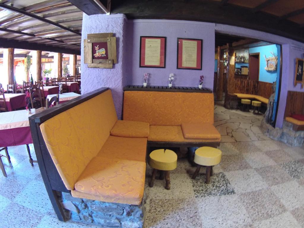 Posezení v ubytování Boustigue Hotel
