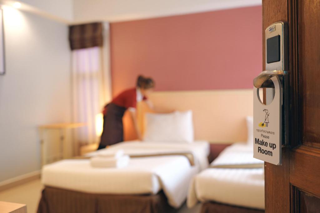 Postel nebo postele na pokoji v ubytování Tubtim Siam Suvarnabhumi Hotel