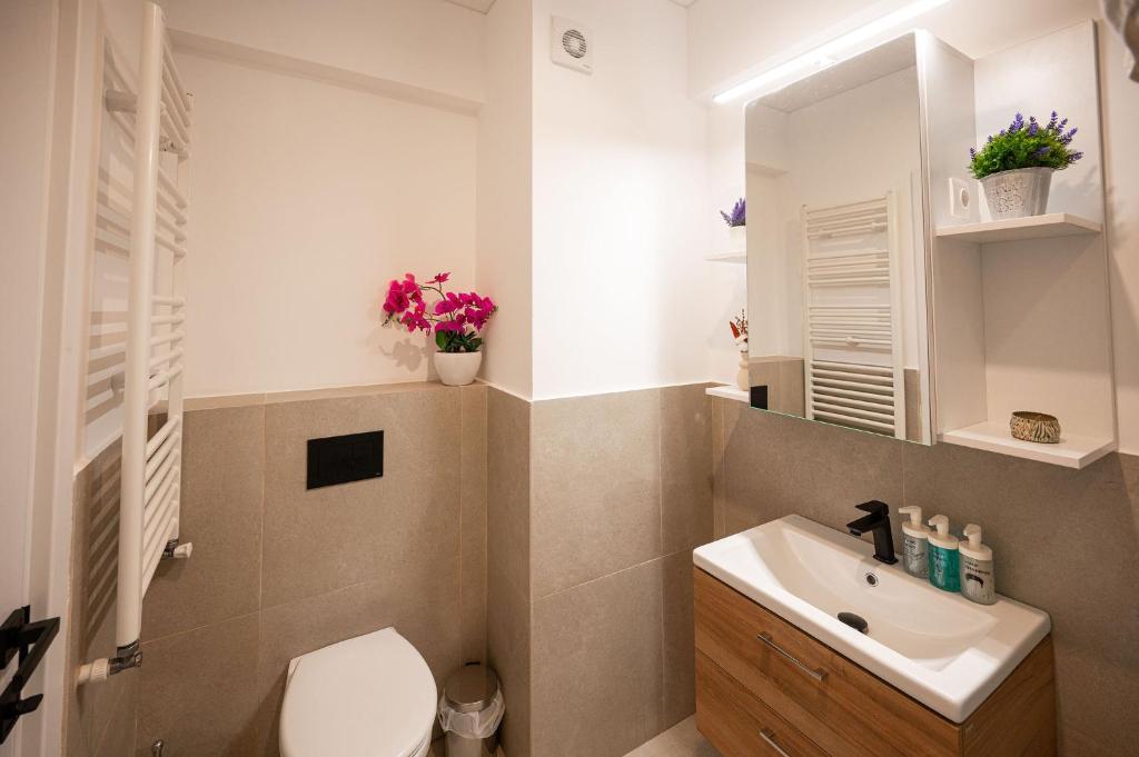 O baie la Beatrice Apartment in Odyssey Pool & Spa-parking