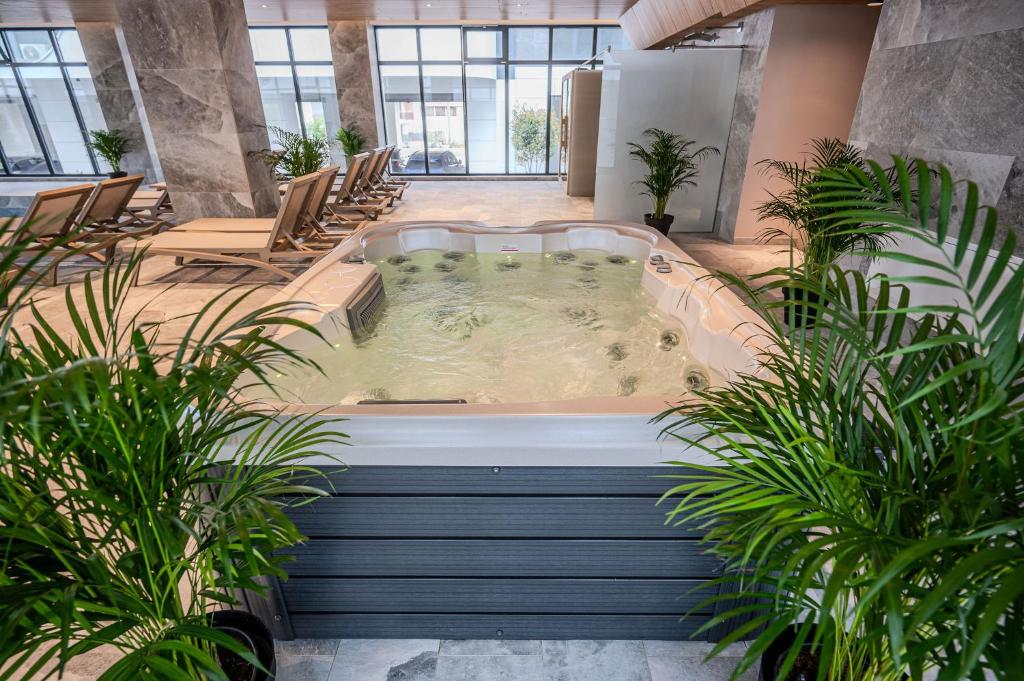 Imagine din galeria proprietății Beatrice Apartment in Odyssey Pool & Spa-parking în Mamaia