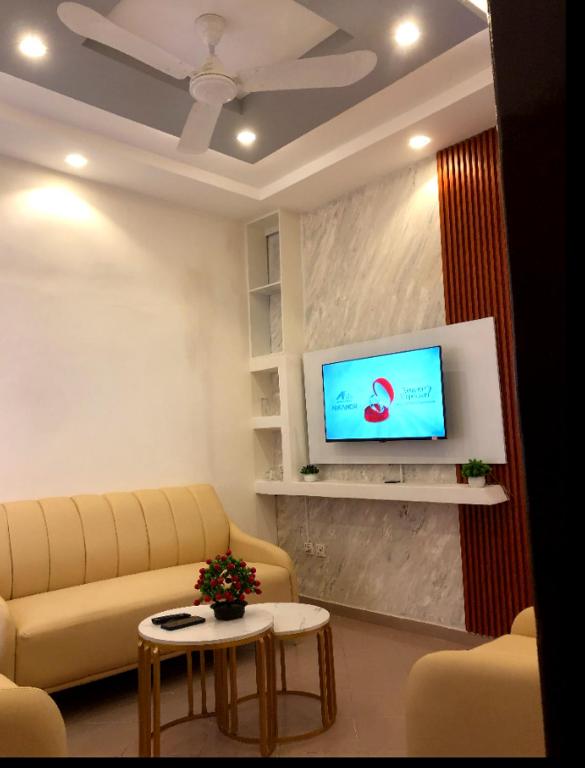 Noukpo Appartement Meublé TV 또는 엔터테인먼트 센터