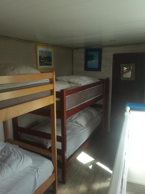 Postel nebo postele na pokoji v ubytování La Chaloupe Chambres d'hotes