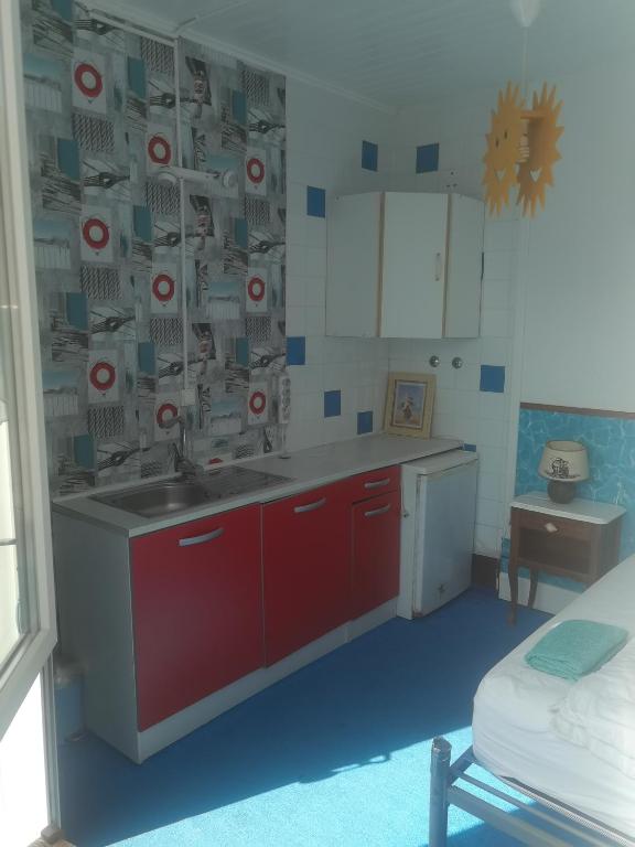 Kuchyň nebo kuchyňský kout v ubytování La Chaloupe Chambres d'hotes