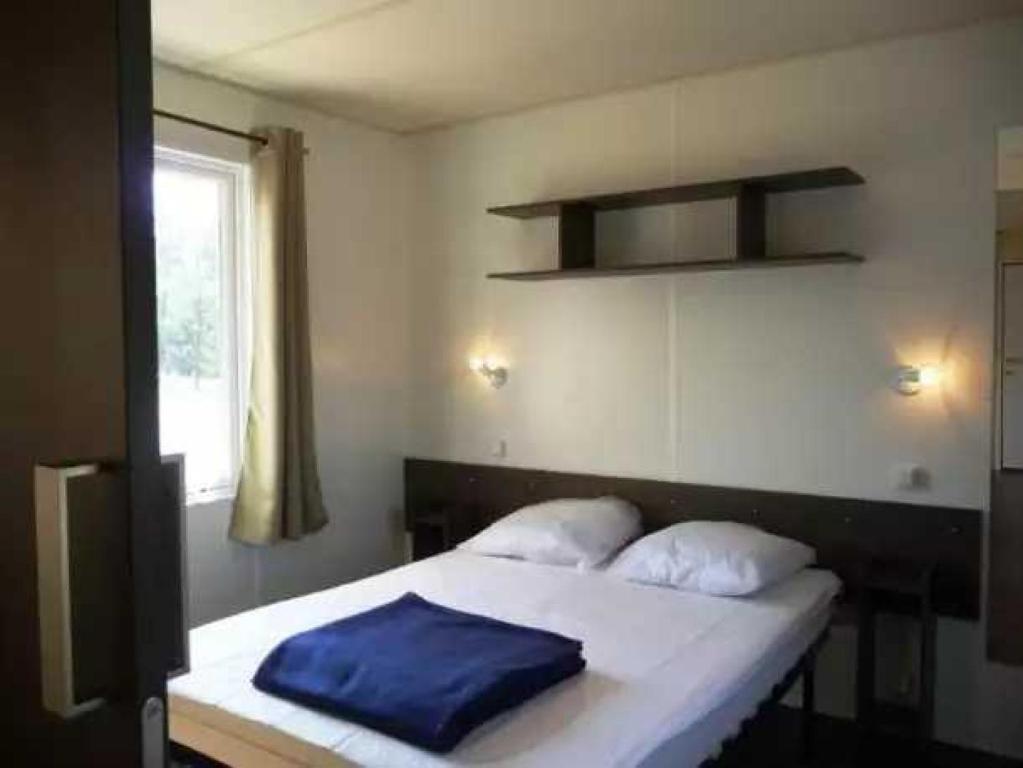 Postel nebo postele na pokoji v ubytování Camping 4 étoiles - Piscine - eebe0d