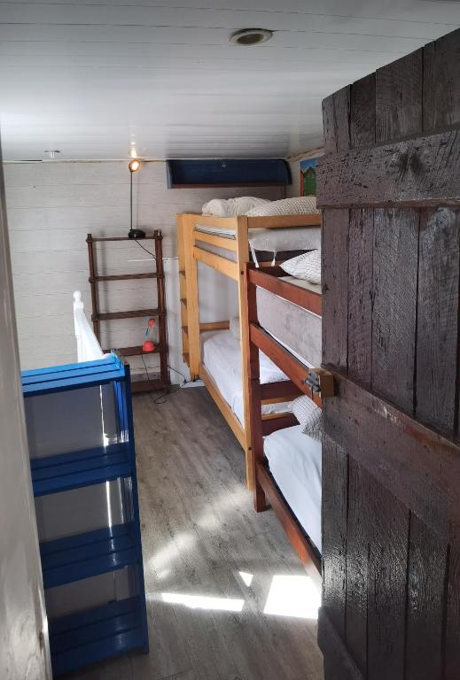 Palanda nebo palandy na pokoji v ubytování La Chaloupe Chambres d'hotes